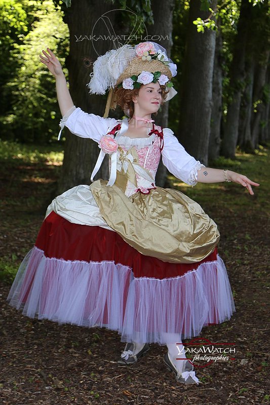 Young woman dancing at the Grand Siecle Experience in the woods of Vaux-le-Vicomte